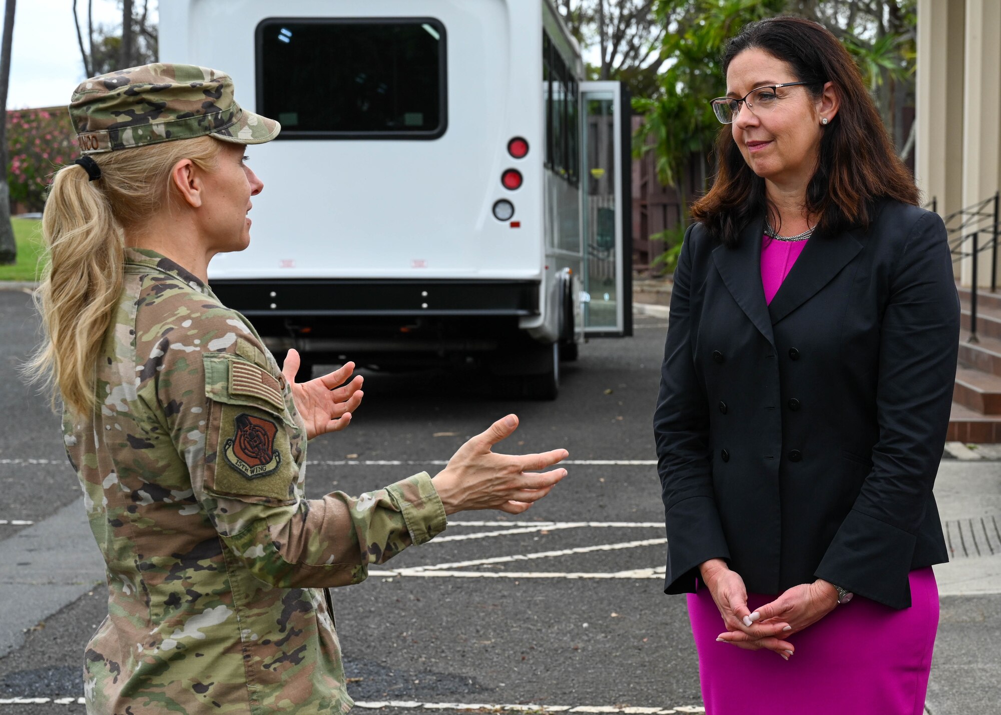 Col. Michele Lo Bianco, 15th Wing commander, converses with Kristyn Jones, assistant secretary of the Air Force for Financial Management and Comptroller, performing the duties of under secretary of the Air Force, during her visit to Joint Base Pearl Harbor-Hickam, Hawaii, May 2, 2023. Lo Bianco and Jones exchanged views on pressing topics regarding the installation and airmen and their families. (U.S. Air Force photo by Senior Airman Zoie Cox)