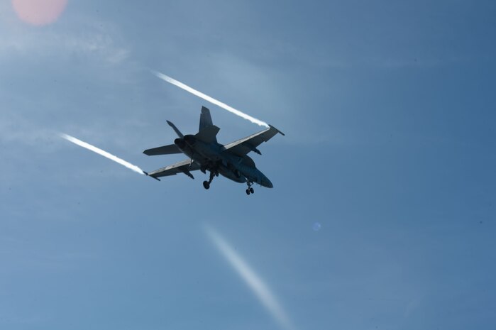An EA-18G Growler conducts flight operations from the USS Theodore Roosevelt