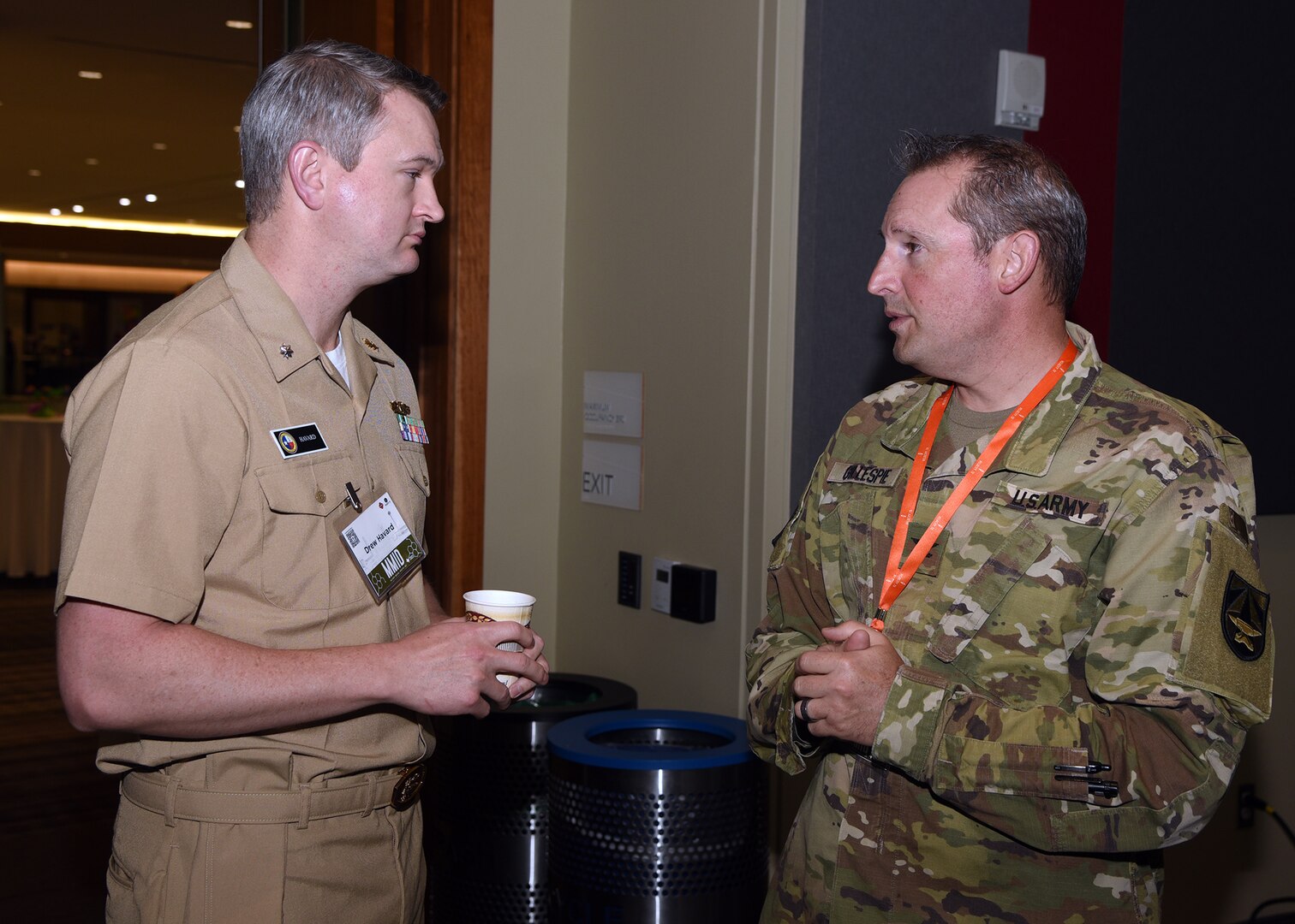 SAN ANTONIO - (May 2, 2023) – Cmdr. Drew Havard, Naval Medical Research Unit (NAMRU) San Antonio’s deputy director for Craniofacial and Restorative Medicine, speaks with U.S. Army Col. Kevin Gillespie at the 4th Military Medical Industry Day (MMID) hosted by VelocityTX, a subsidiary of Texas Research & Technology Foundation, the City of San Antonio, and Bexar County at the Henry B. Gonzalez Convention Center.  Attendees heard welcoming remarks from Mayor Ron Nirenberg, keynote address by Dr. Sean Biggerstaff, acting deputy assistant director, Research and Engineering, Defense Health Agency (DHA) along with various panels, to include but not limited to, “What the Military Wants” and “Military Medical Research and Development (R&D) Funding.”  The MMID provides a platform for innovators and entrepreneurs to learn about military medical requirements, available funding sources to support R&D, and ways to work with the military. NAMRU San Antonio’s mission is to conduct gap driven combat casualty care, craniofacial, and directed energy research to improve survival, operational readiness, and safety of Department of Defense (DoD) personnel engaged in routine and expeditionary operations. It is one of the leading research and development laboratories for the U.S. Navy under the DoD and is one of eight subordinate research commands in the global network of laboratories operating under Naval Medical Research Command (NMRC) in Silver Spring, Md. (U.S. Navy photo by Burrell Parmer, NAMRU San Antonio Public Affairs/Released)