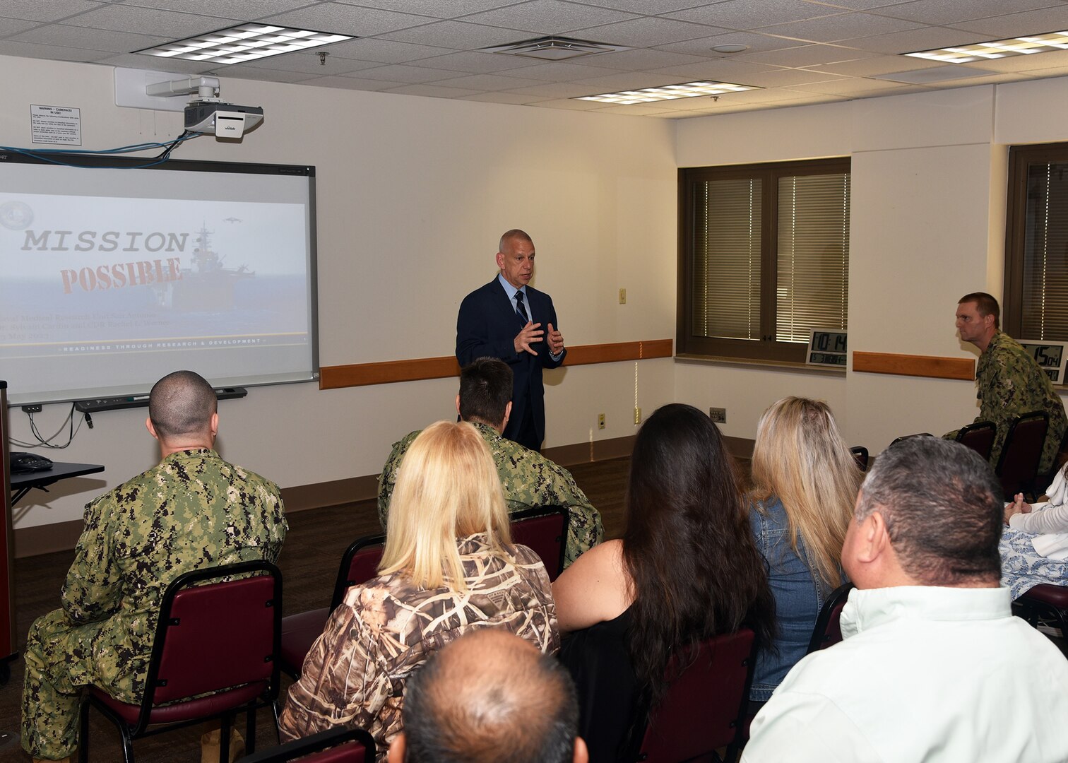 JOINT BASE SAN ANTONIO-FORT SAM HOUSTON – (May 3, 2023) – Chief Science Director Dr. Sylvain Cardin, assigned to Naval Medical Research Unit (NAMRU) San Antonio, speaks on the importance of “Mission Possible”, an information-sharing event held at the Battlefield Health and Trauma (BHT) Research Institute. The purpose of “Mission Possible” is to better inform members of the command on the tactics, techniques, and procedures of the three science directorates to include the resource acquisitions and administrative directorates. NAMRU San Antonio’s mission is to conduct gap driven combat casualty care, craniofacial, and directed energy research to improve survival, operational readiness, and safety of Department of Defense personnel engaged in routine and expeditionary operations. It is one of the leading research and development laboratories for the U.S. Navy under the DoD and is one of eight subordinate research commands in the global network of laboratories operating under the Naval Medical Research Command in Silver Spring, Md. (U.S. Navy photo by Burrell Parmer, NAMRU San Antonio Public Affairs/Released)