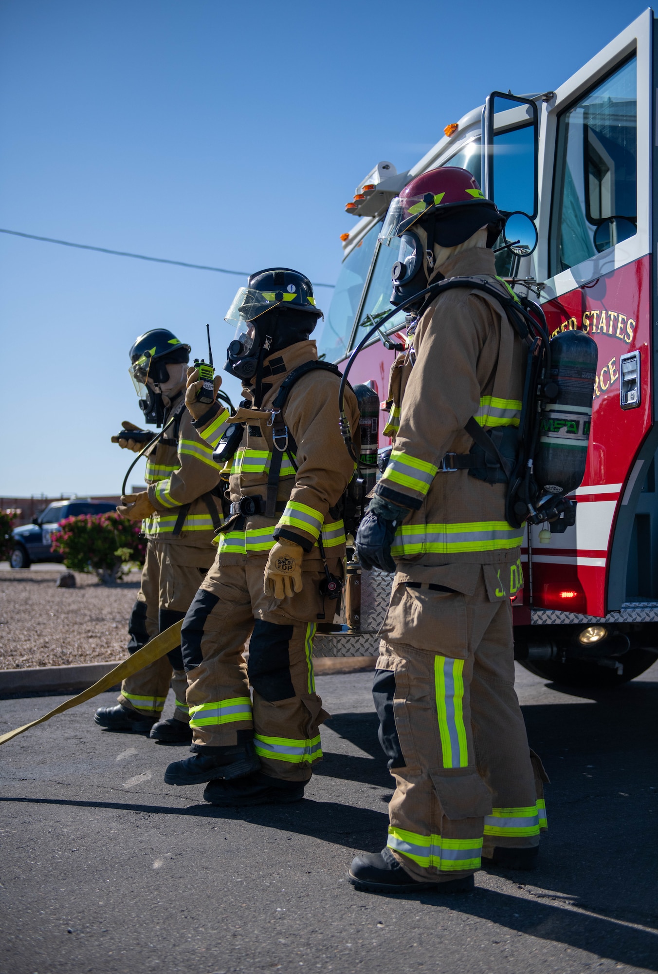 Members of the Luke Air Force Base Fire Department participate in a Defense Logistics Agency fuel spill exercise May 4, 2023, at Luke AFB, Arizona.