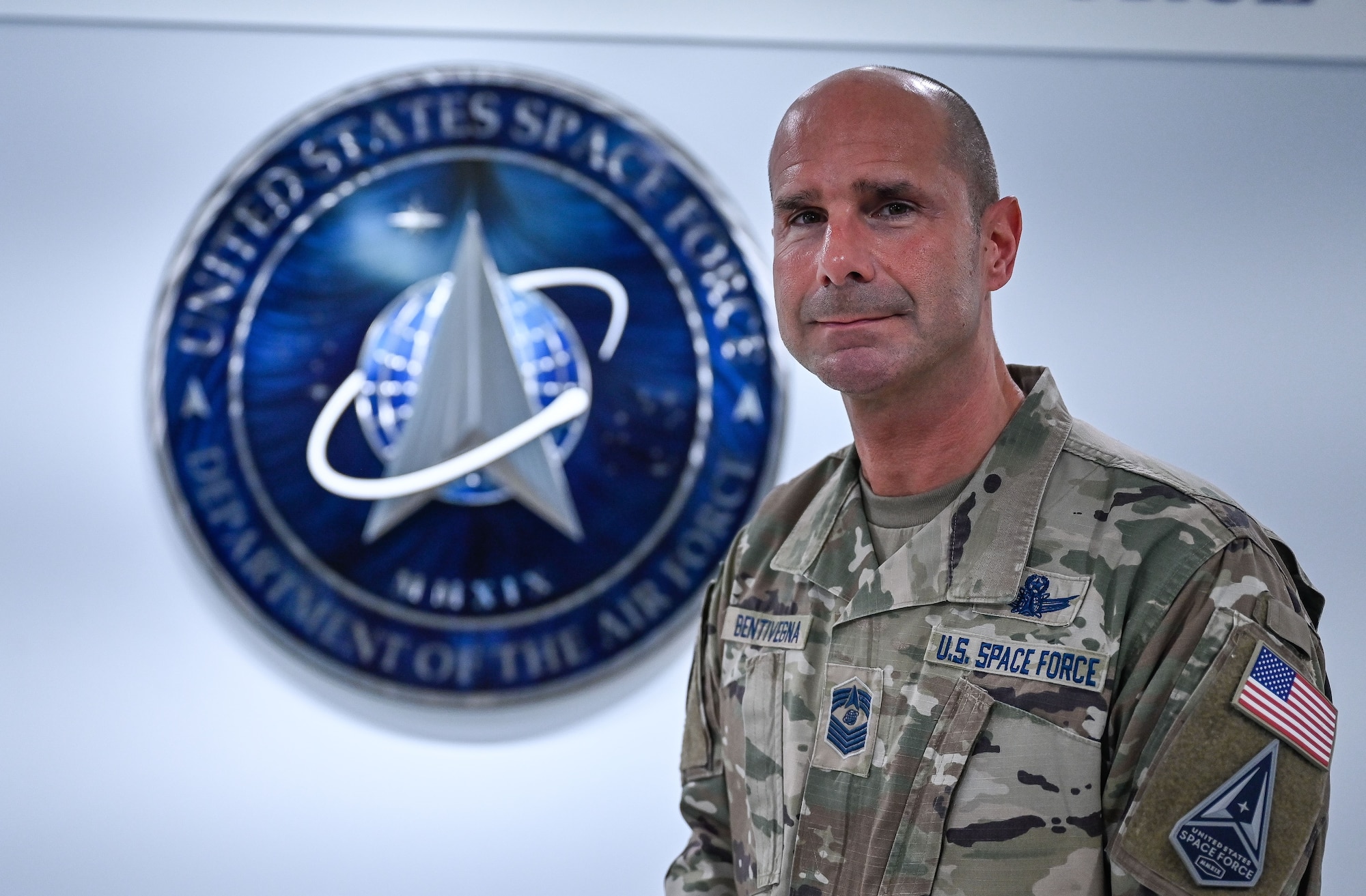 Chief Master Sgt. John F. Bentivegna stands in front of the U.S. Space Force Hallway after receiving news on his selection as the next Chief Master Sergeant of the Space Force, Pentagon, Arlington, Va., May 5, 2023. (U.S. Space Force photo by Senior Master Sgt. Sara Keller)