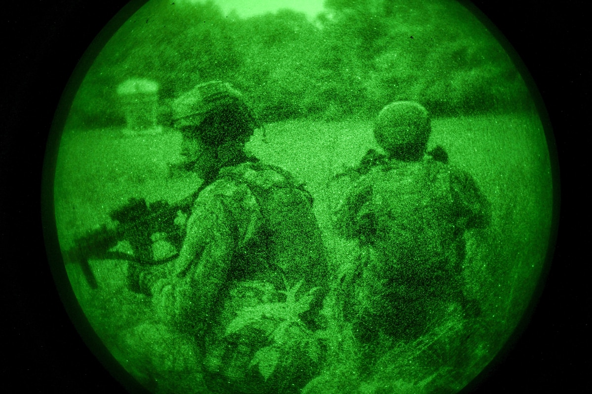 men in uniform patrol at night
