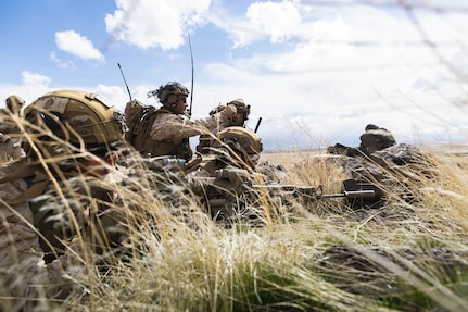 U.S. Marines with 1st Marine Division locate their target points during exercise Garnet Rattler on Saylor Creek Range in Grasmere, Idaho, April 18, 2023. Garnet Rattler is a joint exercise between Marines and airmen to train Joint Terminal Attack Controllers to be more efficient and lethal in a realistic training environment.