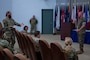 U.S. Air Force Lt. Col. Jack Barnett, 9th Combat Operations Squadron (9 COS) chief, left, asks a question to U.S. Marine Corps Master Gunnery Sgt. Scott H. Stalker, U.S. Space Command command senior enlisted leader, at Space Delta ‘s auditorium on Vandenberg Space Force Base, Calif., May 6, 2023. Stalker opened the floor up for a Q &A portion after his brief to 9 COS members. The 9 COS is an Air Force Reserve Command space operations unit and is the Reserve Associate unit to Space Delta 5, which augments intelligence, planning and operations at the Combined Space Operations Center. (U.S. Space Force photo by Tech. Sgt. Luke Kitterman)