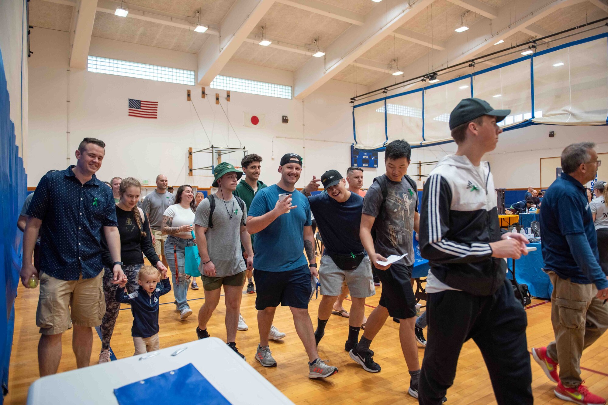 People walking inside a gym