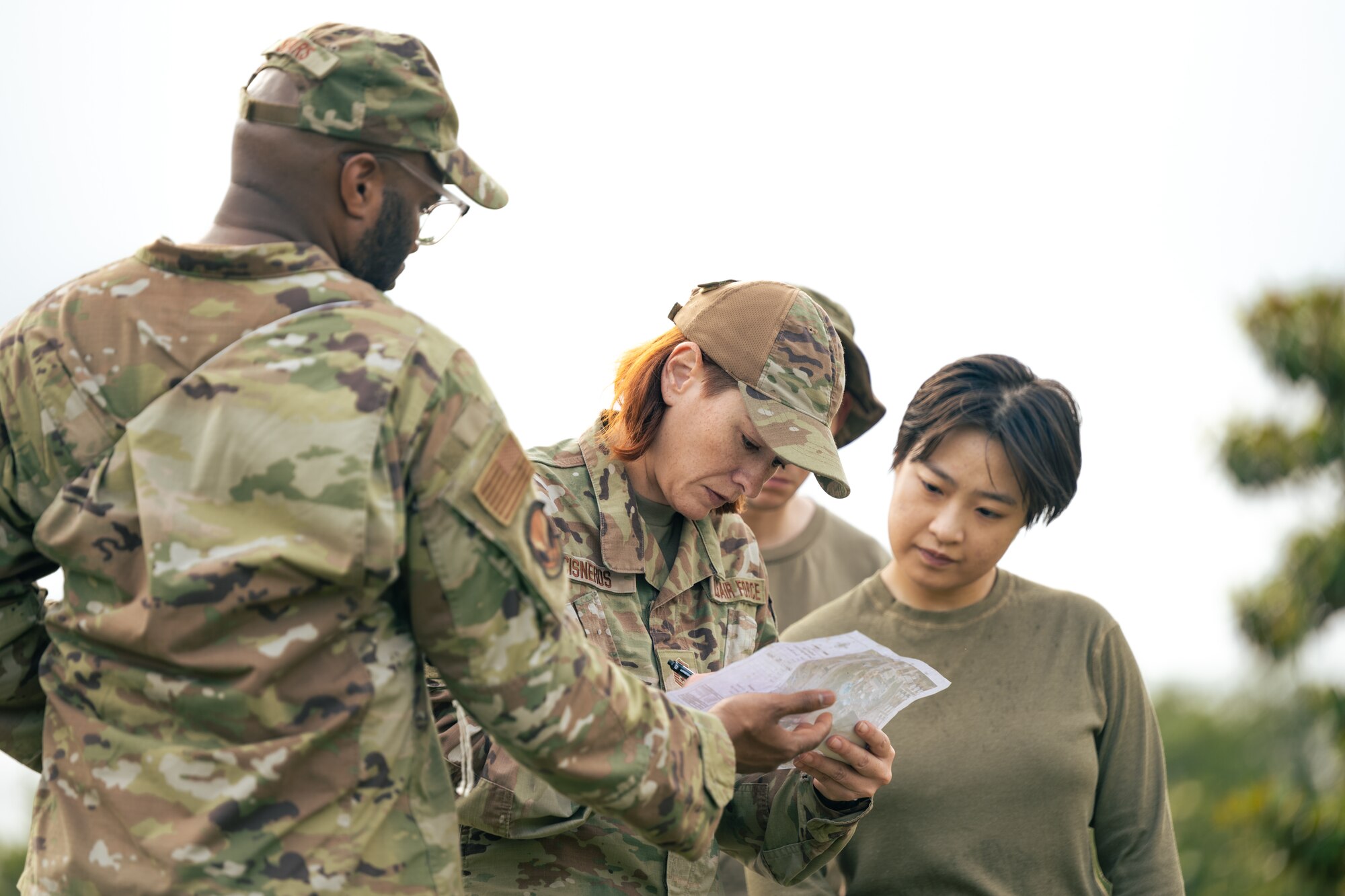 U.S. Air Force Airmen assigned to the 1st Special Operation Civil Engineer Squadron, discuss a land navigation exercise at Hurlburt Field, Fla., April 28, 2023.