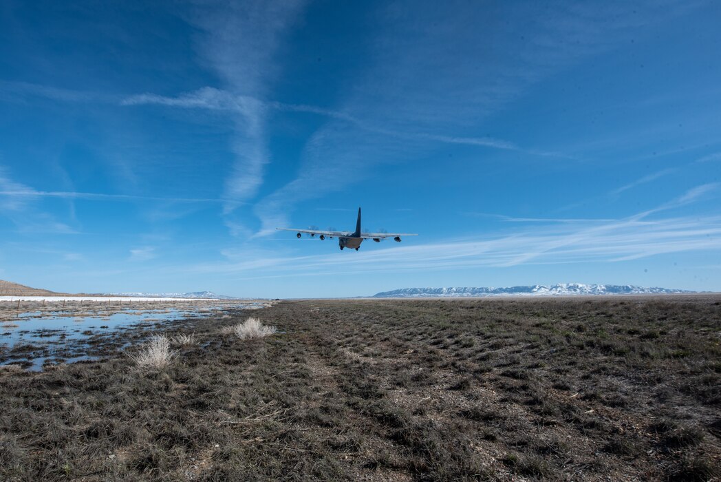 An MC-130J Commando II with the 1st Special Operations Wing takes off from Highway 287 in Wyoming during Exercise Agile Chariot on April 30, 2023, honing capabilities linked to Agile Combat Employment. Instead of relying on large, fixed bases and infrastructure, ACE employs smaller, more dispersed locations and teams to rapidly move aircraft, pilots and other personnel as needed. Under ACE, millions of miles of public roads can serve as functional runways with Forward Arming and Refueling Points when necessary. (U.S. Air National Guard photo by Master Sgt. Phil Speck)