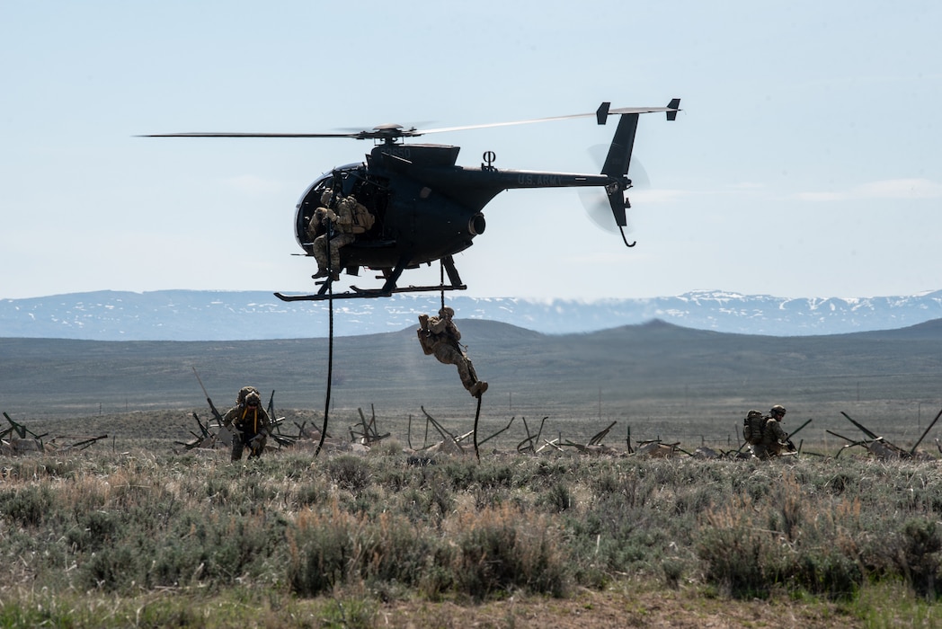 Airmen with the Kentucky Air National Guard’s 123rd Special Tactics Squadron fast rope from a MH-6M Little Bird to perform combat search-and-rescue during Exercise Agile Chariot near Riverton, Wyoming on May 2, 2023. Agile Chariot tested Agile Combat Employment capabilities, including using smaller, more dispersed locations and teams to rapidly move and support aircraft, pilots and other personnel wherever they’re needed. (U.S. Air National Guard photo by Master Sgt. Phil Speck)