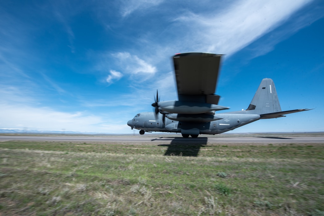 An MC-130J Commando II from the 1st Special Operations Wing takes off from Highway 789 during Exercise Agile Chariot near Riverton, Wyoming, May 2, 2023. Agile Chariot tested Agile Combat Employment capabilities, including using smaller, more dispersed locations and teams to rapidly move and support aircraft, pilots and other personnel wherever they’re needed. (U.S. Air National Guard photo by Master Sgt. Phil Speck)