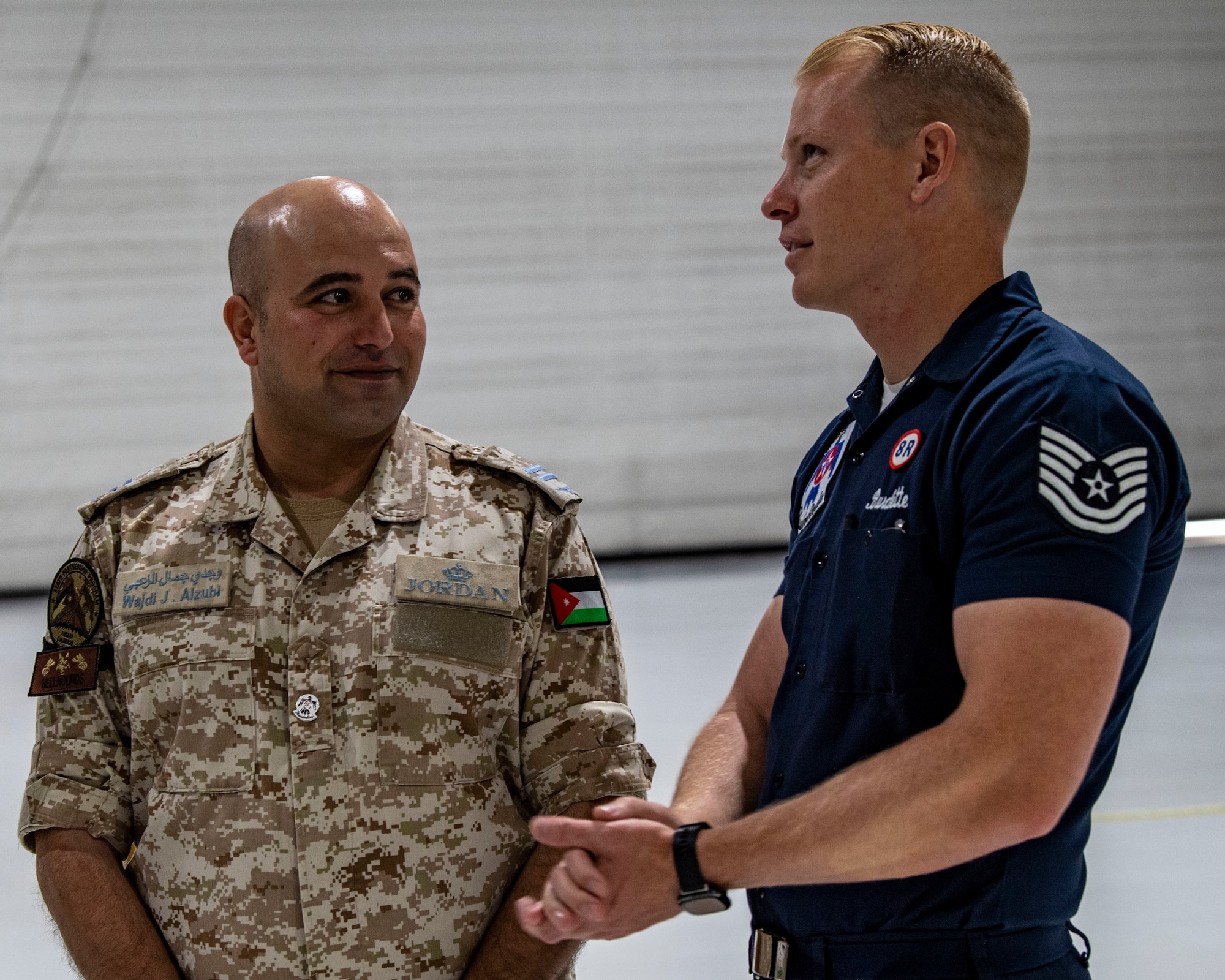 Jordanian Warrant Officer talking to Thunderbird recruiter