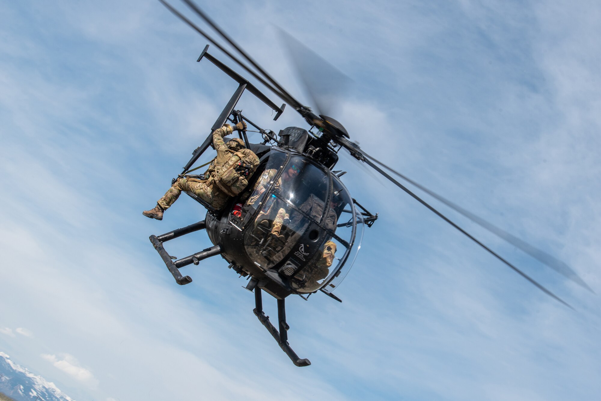 An MH-6M Little Bird extracts 123rd Special Tactics Squadron Airmen during Exercise Agile Chariot near Riverton, Wyoming, May 2, 2023. Agile Chariot tested Agile Combat Employment capabilities, including using smaller, more dispersed locations and teams to rapidly move and support aircraft, pilots and other personnel wherever they’re needed. (U.S. Air National Guard photo by Master Sgt. Phil Speck)