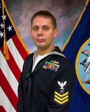 230323-N-N0443-8001 NORFOLK, Va. – Official portrait of Retail Services Specialist 1st Class Joseph Hintz. Hintz, a Sailor stationed at Naval Support Activity Hampton Roads, encourages Sailors to take advantage of education benefits offered through the Navy College Program.  Since serving in the Navy, Hintz received both an associate and bachelor’s degree by using Tuition Assistance. (U.S. Navy courtesy photo)