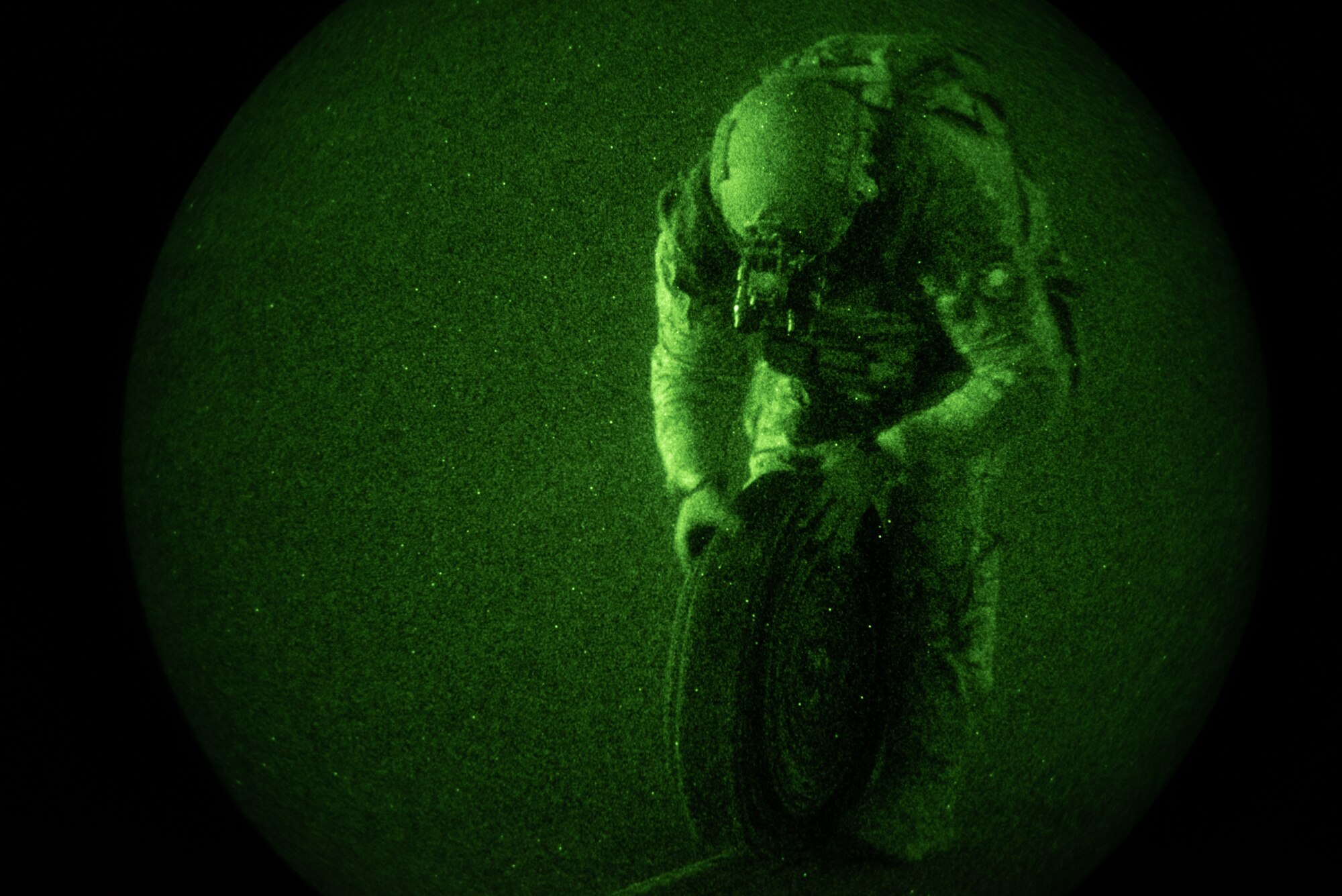 A U.S. Air Force Forward Area Refueling Point (FARP) specialist assigned to the 100th Air Refueling Wing, rolls up a fuel hose after the end of a FARP mission, Norway, March 10, 2023.