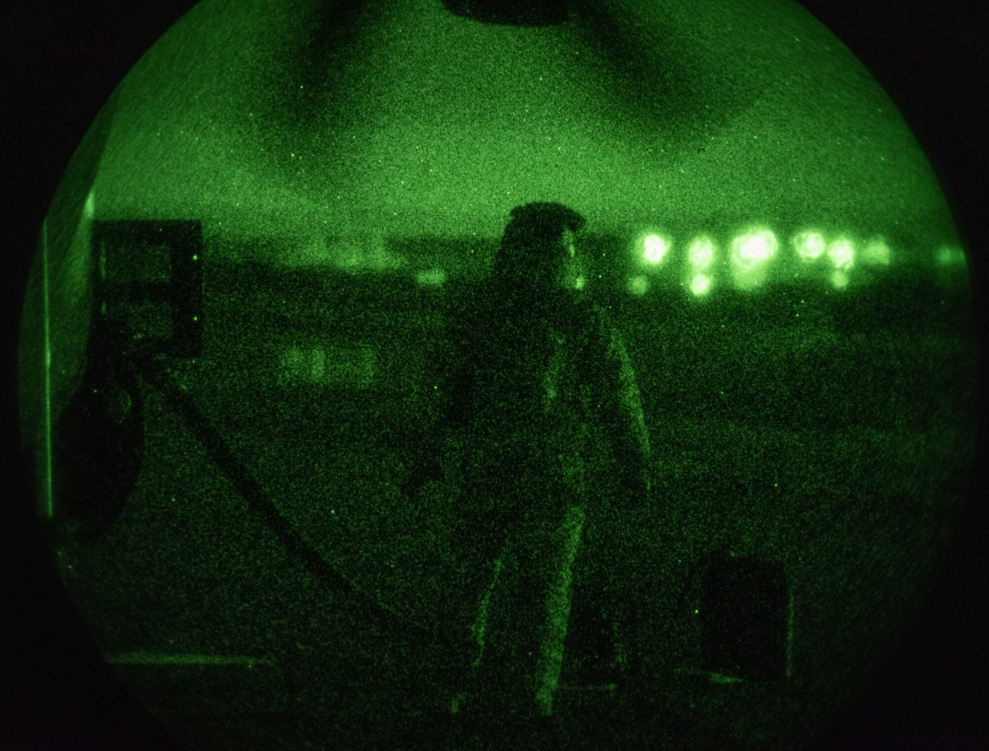 A U.S. Air Force 352nd Special Operations Wing loadmaster, oversees the connection of the fuel hose to the MC-130J Commando II aircraft, Norway, March 10, 2023.