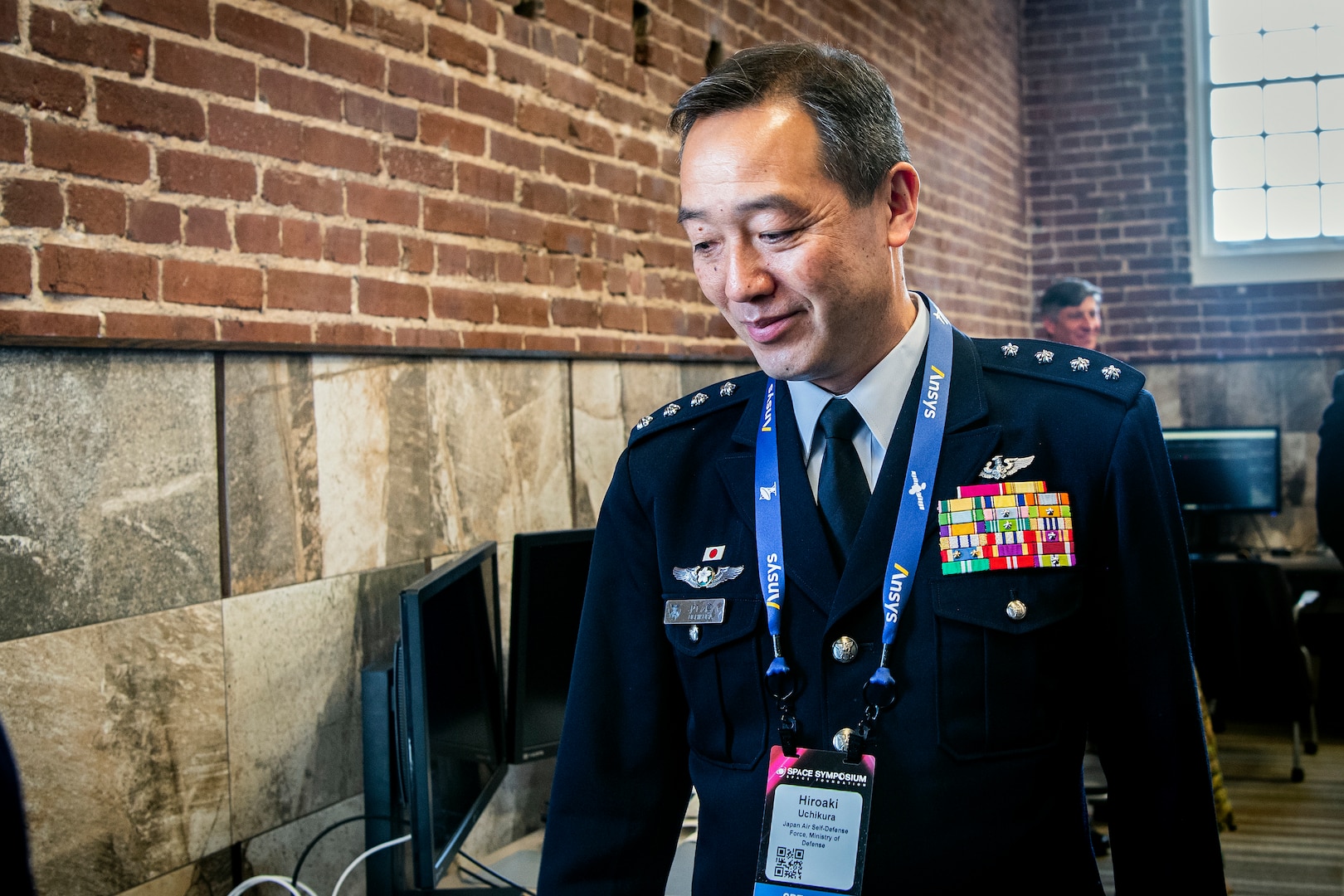 Gen. Hiroaki Uchikura, Japan Air Self-Defense Force chief of staff smiles for a photo in uniform