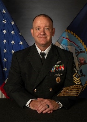 Official studio photo of Commander Master Chief Ron Glass, command master chief, Carrier Strike Group (CSG) 8
