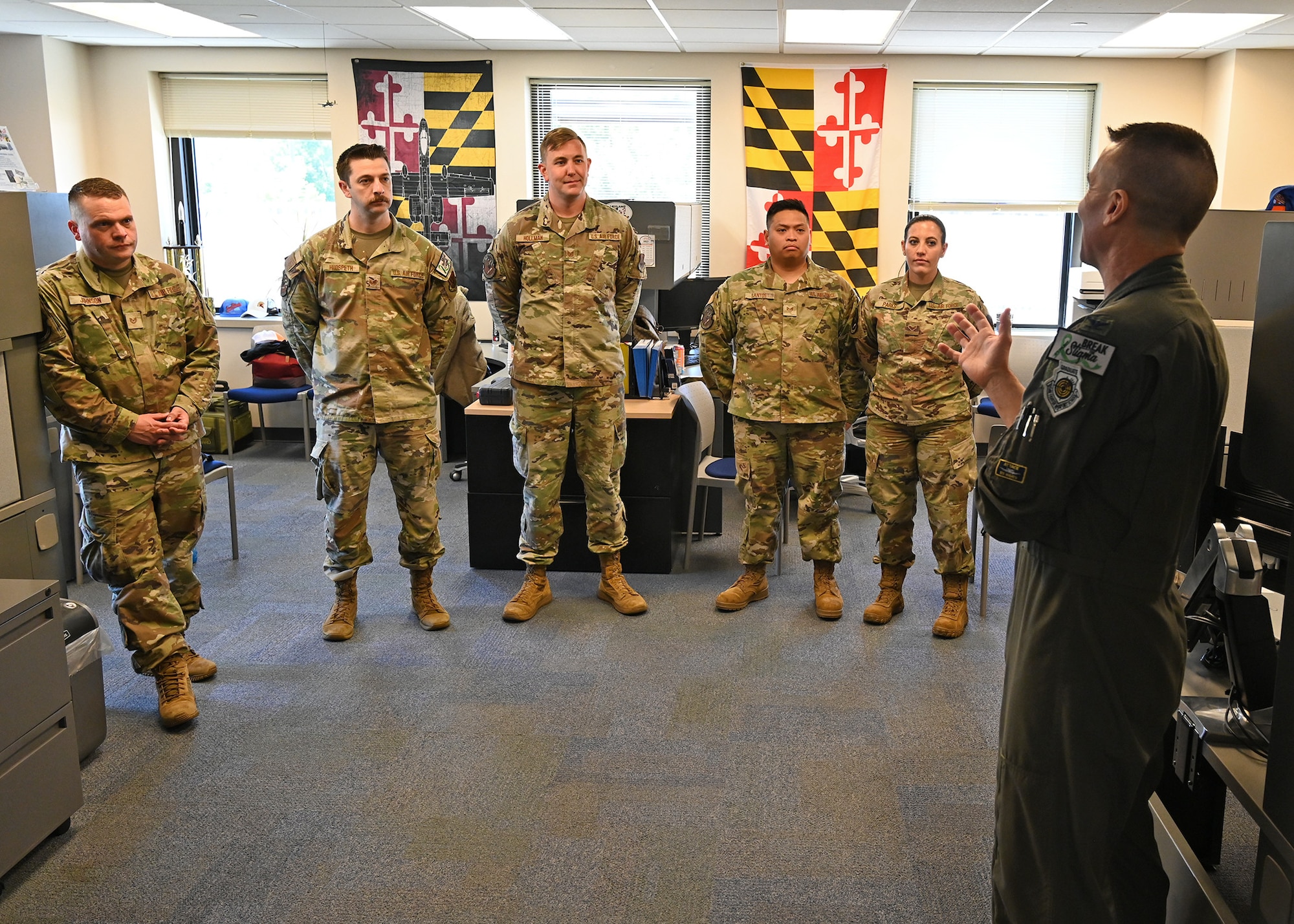U.S. Air Force Col. Richard Hunt, 175th Wing vice commander, congratulates members of the 175th Wing recruiting team at Martin State Air National Guard Base, Middle River, Md., May 6, 2023, after they received the Air Force Recruiting Service Top III Chief Master Sgt. Brad W. Esposito Team Leadership Award for their accomplishments in the first quarter of fiscal year 2023.