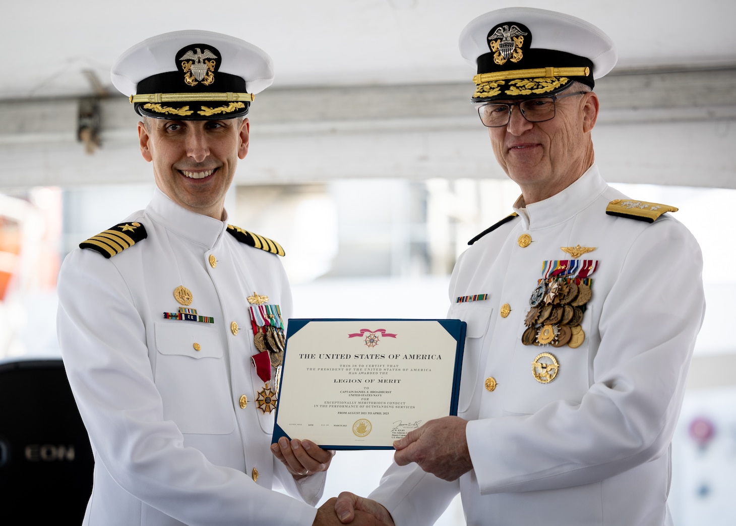Military Sealift Command’s leadership in the Atlantic changed hands, when Navy Capt. James A. Murdock relieved Navy Capt. Daniel E. Broadhurst as commander of Norfolk-based Military Sealift Command Atlantic (MSC Atlantic) during a change of command ceremony held aboard Navy hospital ship USNS Comfort (T-AH-20) in Naval Station Norfolk April 13, 2023. In this picture, Broadhurst (left) receives Legion of Merit award from Rear Adm. Michael A. Wettlaufer (right), commander of MSC.