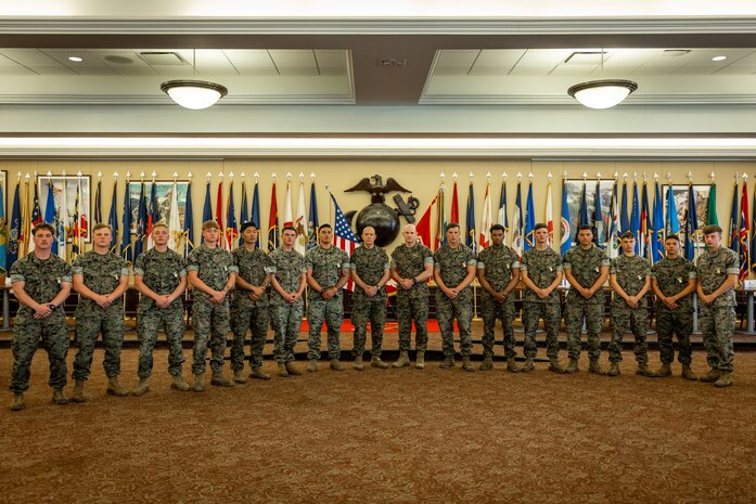 U.S. Marines from 1st Battalion, 8th Marines, 2nd Marine Division, pose for a group photo with Gen. David Berger, Commandant of the Marine Corps, and Sgt. Maj. Troy Black, Sergeant Major of the Marine Corps, during the annual Marine Corps rifle squad competition awards ceremony in the Hawkins Room at The Basic School on Marine Corps Base Quantico, Virginia, April 27, 2023.The annual Marine Corps rifle squad competition is a service-recognized competitive environment to determine, under simulated combat conditions, which Marine rifle squad most effectively demonstrates their combat capabilities and operational proficiency.