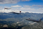 A Colorado Air National Guard F-16 Fighting Falcon with the 100th Anniversary in Aviation design flies in formation over central Colorado with a P-51 Mustang and an F-35 Lightning II celebrating the Colorado Air National Guard’s legacy of aviation in Colorado, May 8, 2023. The COANG has been a pioneer in leveraging aviation as the state and national defense for a century and has continually adapted and innovated this technology to remain Always Ready, Always There. (U.S. Air Force photo by Master Sgt. Matthew Plew)