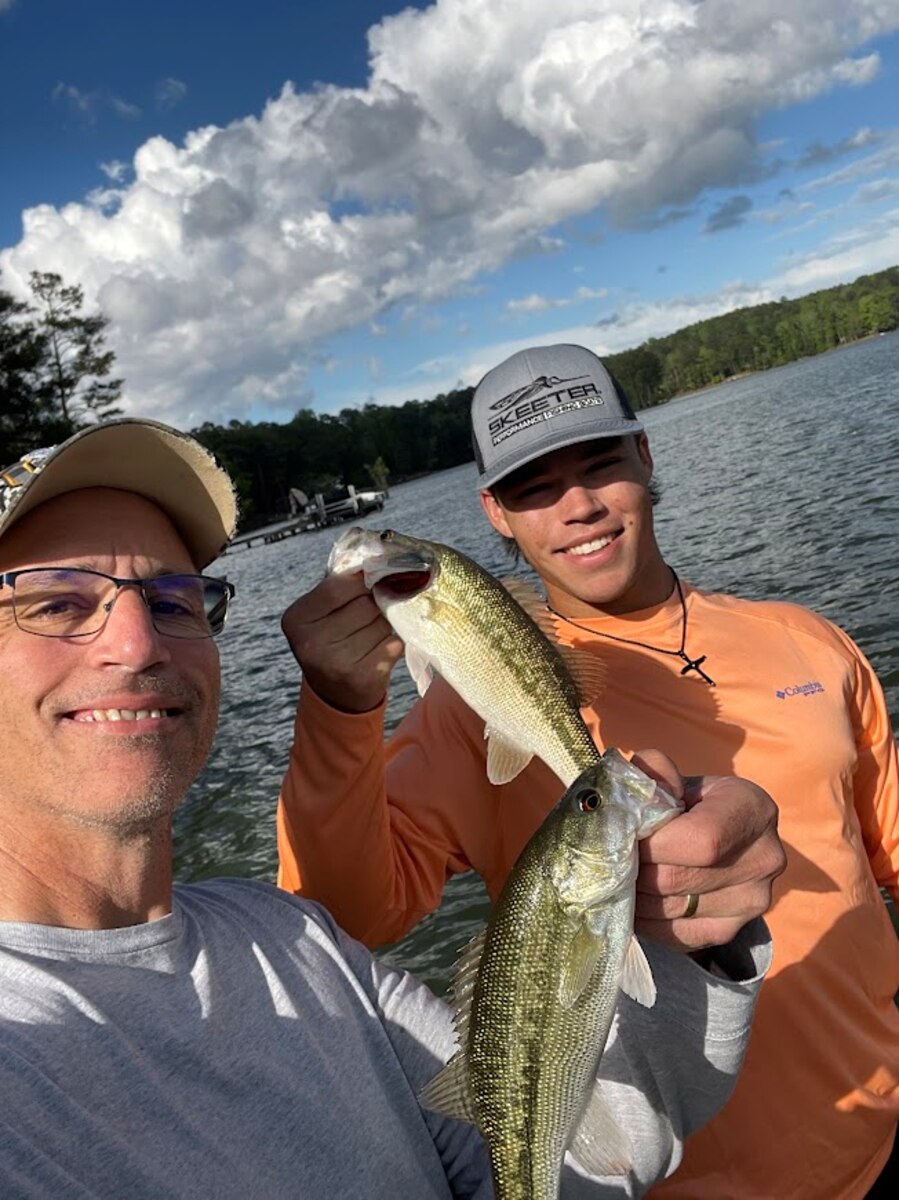 Michael Schuyler AFWERX videographer, and his son go fishing on Lake Martin in Eclectic, Alabama, April 13, 2023. AFWERX is encouraging physical and mental health with the “22 For You Challenge.” The idea of the challenge is simple: a participant will take 22 minutes each day to focus on something that brings joy in their life. The intention of the challenge is to create a lasting habit of self-care and improve long-term well-being. (Contributed photo)