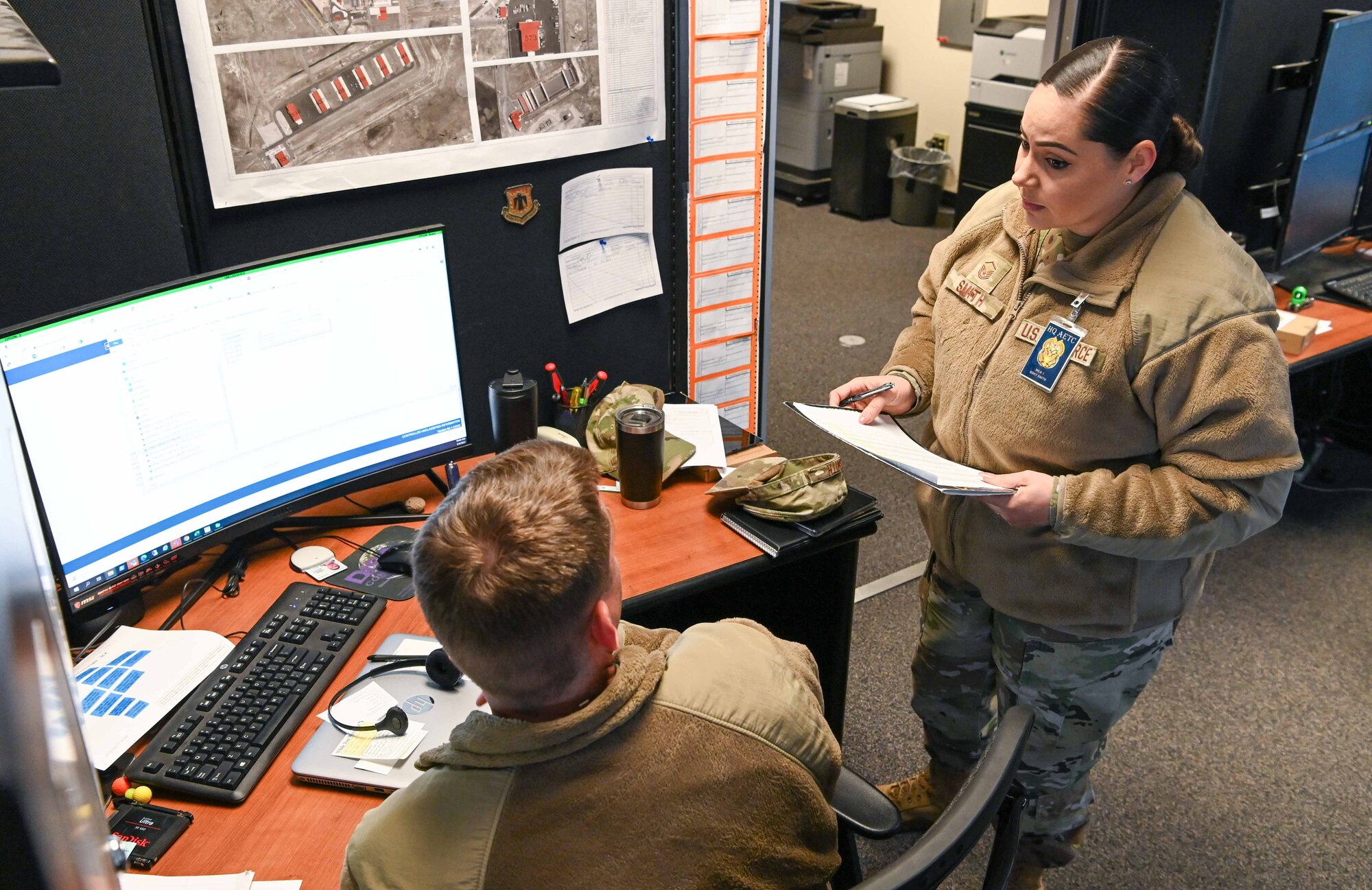 Airmen inspecting