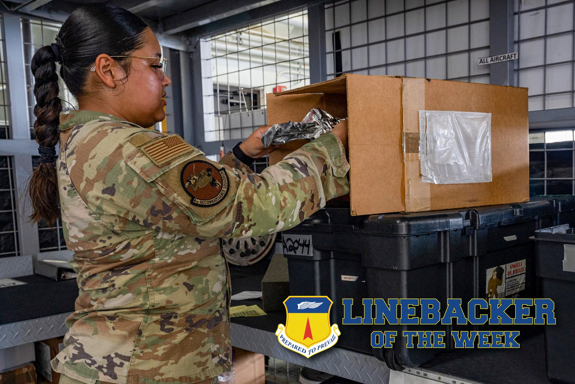 U.S. Air Force Senior Airman Gabriella Balines, a decentralized material support specialist assigned to the 4th Reconnaissance Squadron, opens a package to inspect an aircraft part at Andersen Air Force Base, Guam, May 3, 2023. The Team Andersen Linebacker of the Week recognizes outstanding enlisted, officer, civilian and total force personnel who have had an impact on achieving Team Andersen’s mission, vision and priorities. (U.S. Air Force photo by Senior Airman Jasmine Barnes)