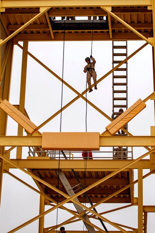New U.S. Marines with Charlie Company, 1st Recruit Training Battalion, fast down the rappel tower training at Marine Corps Recruit Depot, San Diego, April 28, 2023.