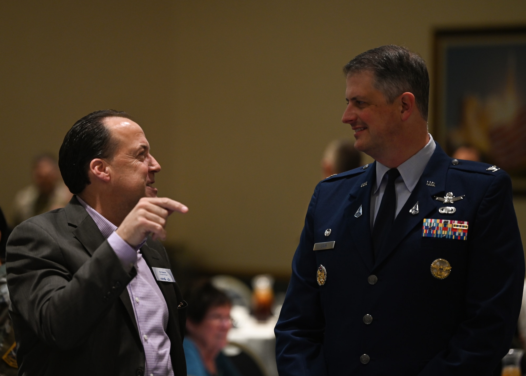 U.S. Space Force Col. Robert Long, Space Launch Delta 30 commander, speaks with an attendee of the annual State of Vandenberg address on Vandenberg Space Force Base, Calif., March 15, 2023. During his remarks, Long shared that in 2022 the base had its busiest 12 months in 26 years. He also highlighted that Vandenberg will continue to have an integral part in the space industry's increase in activity and that it is crucial to national security. (U.S. Space Force photo by Airman 1st Class Ryan Quijas)