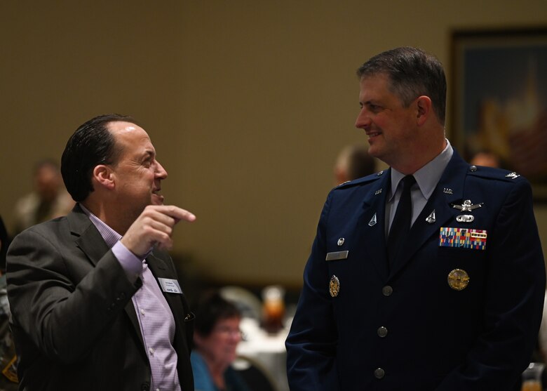 U.S. Space Force Col. Robert Long, Space Launch Delta 30 commander, speaks with an attendee of the annual State of Vandenberg address on Vandenberg Space Force Base, Calif., March 15, 2023. During his remarks, Long shared that in 2022 the base had its busiest 12 months in 26 years. He also highlighted that Vandenberg will continue to have an integral part in the space industry's increase in activity and that it is crucial to national security. (U.S. Space Force photo by Airman 1st Class Ryan Quijas)