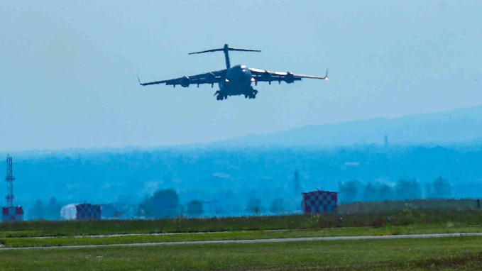 A C-17 Globemaster III aircraft from the 62nd Airlift Wing, based out of Joint Base Lewis-McChord, Wash. arrives for the start of Defender 23 exercise