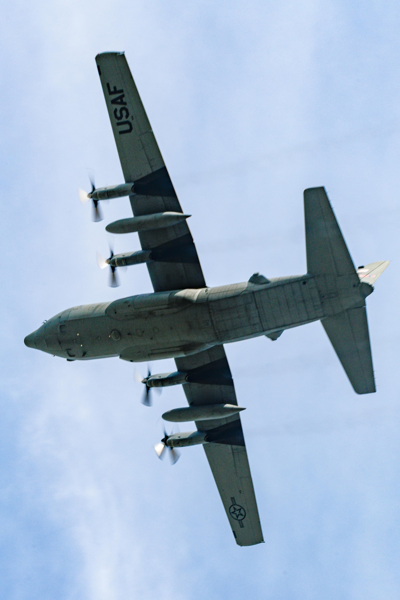 A C-130H Hercules aircraft passes over Youngstown Air Reserve Station, Ohio, May 6, 2023.