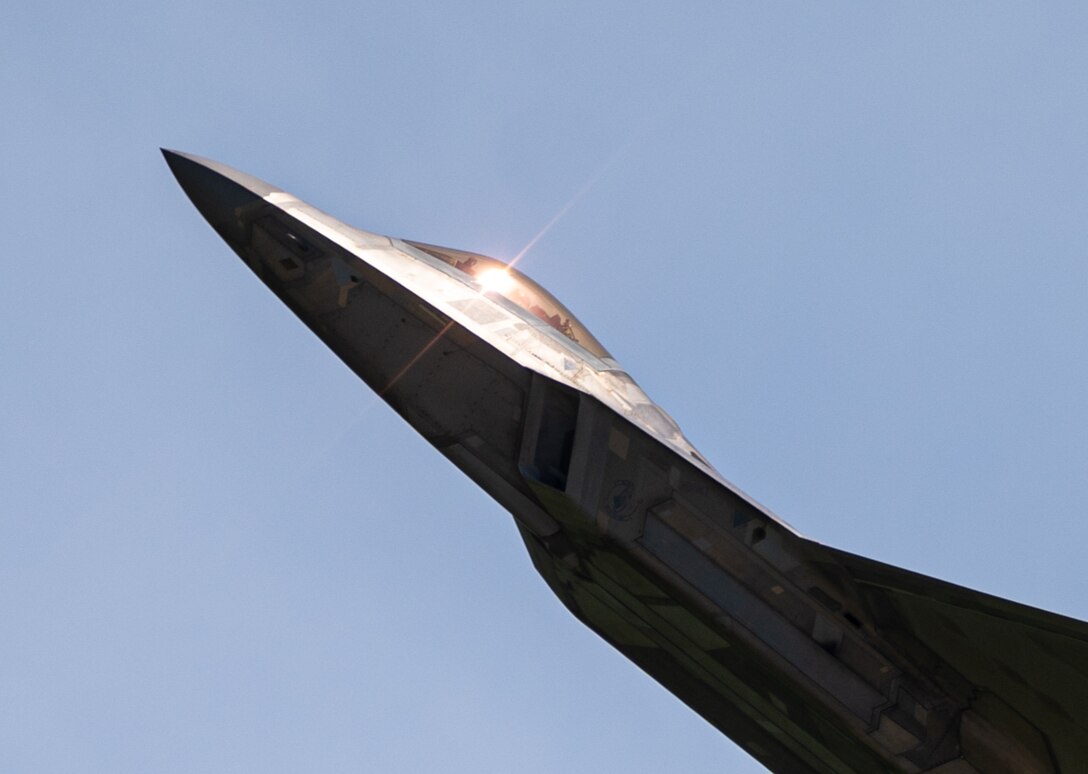 A jet fly's during an air show.