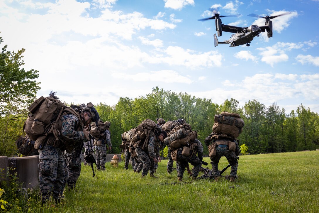 U.S. Marines 1st Marine Division conduct an air insert at The Basic School during a service-level Marine rifle squad competition hosted by Training Command on Marine Corps Base Quantico, Virginia, April 24, 2023.The annual Marine Corps rifle squad competition is a service-recognized competitive environment to determine, under simulated combat conditions, which Marine rifle squad most effectively demonstrates their combat capabilities and operational proficiency. (U.S. Marine Corps photo by Lance Cpl. Joaquin Dela Torre)