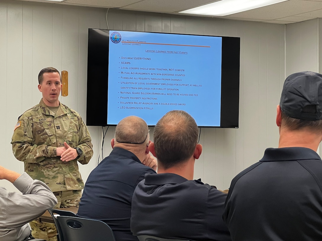 1st Sgt. Jason Rhodes and other members of the Kentucky National Guard County Outreach Team speak to Harrison County emergency services and elected officials May 2nd in Cynthiana, KY to discuss emergency planning and identify any shortfalls in resources where the Guard can assist. (U.S. Army National Guard Photo by Milt Spalding)