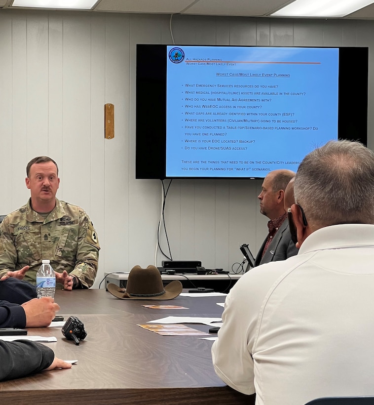 1st Sgt. Jason Rhodes and other members of the Kentucky National Guard County Outreach Team speak to Harrison County emergency services and elected officials May 2nd in Cynthiana, KY to discuss emergency planning and identify any shortfalls in resources where the Guard can assist. (U.S. Army National Guard Photo by Milt Spalding)