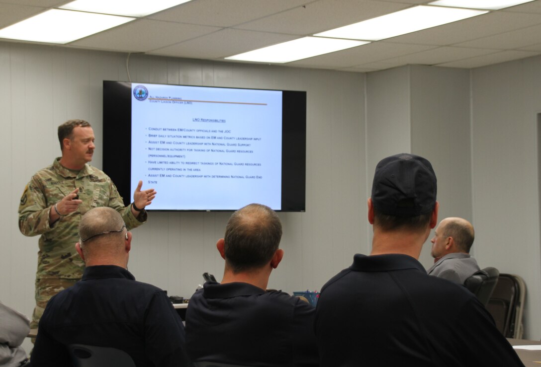 1st Sgt. Jason Rhodes and other members of the Kentucky National Guard County Outreach Team speak to Harrison County emergency services and elected officials May 2nd in Cynthiana, KY to discuss emergency planning and identify any shortfalls in resources where the Guard can assist. (U.S. Army National Guard Photo by Milt Spalding)