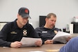 1st Sgt. Jason Rhodes and other members of the Kentucky National Guard County Outreach Team speak to Harrison County emergency services and elected officials May 2nd in Cynthiana, KY to discuss emergency planning and identify any shortfalls in resources where the Guard can assist. (U.S. Army National Guard Photo by Milt Spalding)