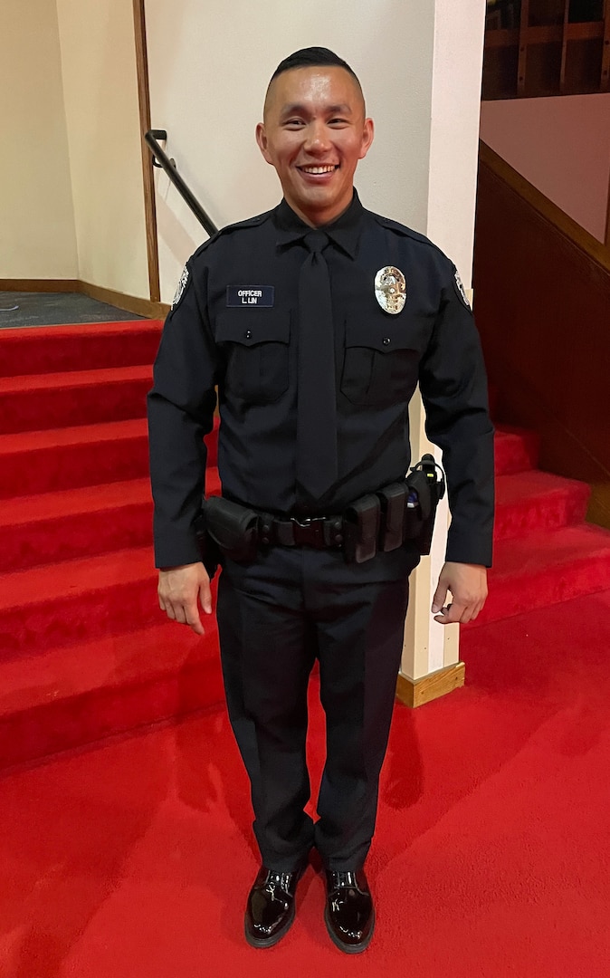 Washington Army National Guard Officer Candidate Lin Lin, in his Bellevue Police Department uniform after graduating from Basic Law Enforcement Academy in April 2023.