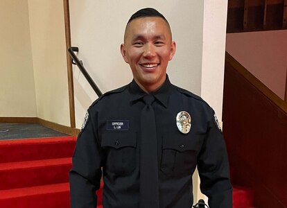 Washington Army National Guard Officer Candidate Lin Lin, in his Bellevue Police Department uniform after graduating from Basic Law Enforcement Academy in April 2023.