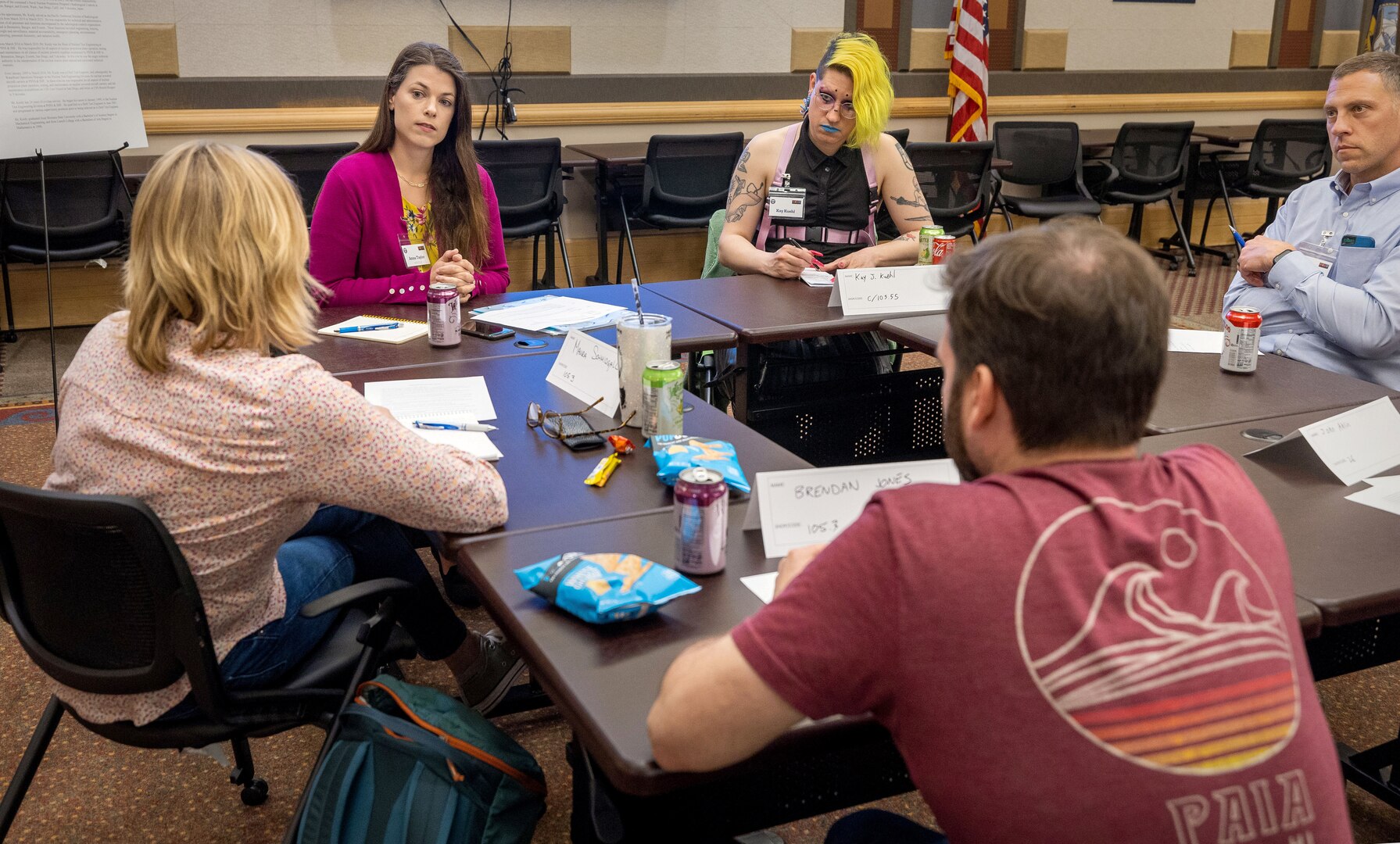 Anna Taylor, middle left, public affairs officer, Code 1160, Congressional and Public Affairs Office, leads a group discussion with mentees.