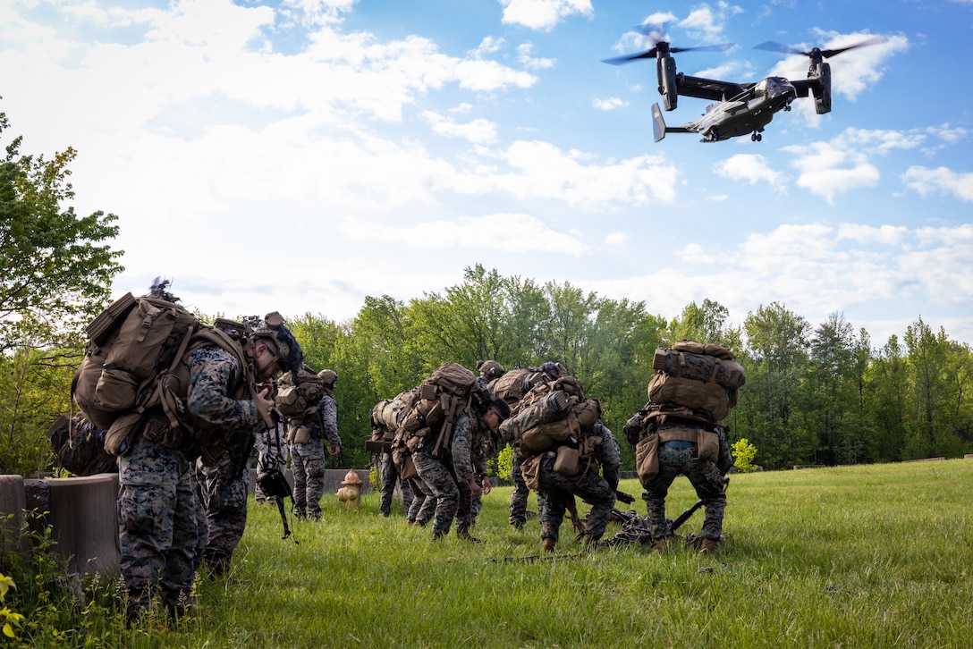 U.S. Marines 1st Marine Division conduct an air insert at The Basic School during a service-level Marine rifle squad competition hosted by Training Command on Marine Corps Base Quantico, Virginia, April 24, 2023.The annual Marine Corps rifle squad competition is a service-recognized competitive environment to determine, under simulated combat conditions, which Marine rifle squad most effectively demonstrates their combat capabilities and operational proficiency. (U.S. Marine Corps photo by Lance Cpl. Joaquin Dela Torre)