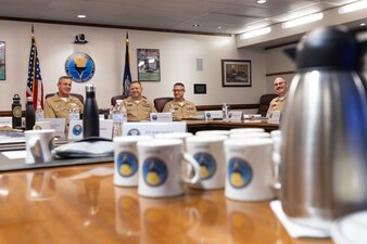 Rear Adm. Pete Garvin, commander, Naval Education and Training Command (NETC), left, Force Master Chief Rick Mengel, center, NETC’s force master chief, and Electronics Technician
Master Chief Matthew Reed, right, NETC’s senior enlisted advisor, meet with the NETC domain fiscal year 2022 Sailor of the Year (SOY) candidates and their command master chiefs during
NETC SOY Recognition Week at NETC Headquarters in Pensacola, Florida, May 9, 2023. NETC's mission is to recruit, train and deliver those who serve our nation, taking them from street-to-fleet by forging civilians into highly skilled, operational and combat ready warfighters. (United States Navy photo by Mass Communication Specialist 2nd Class Zachary Melvin)