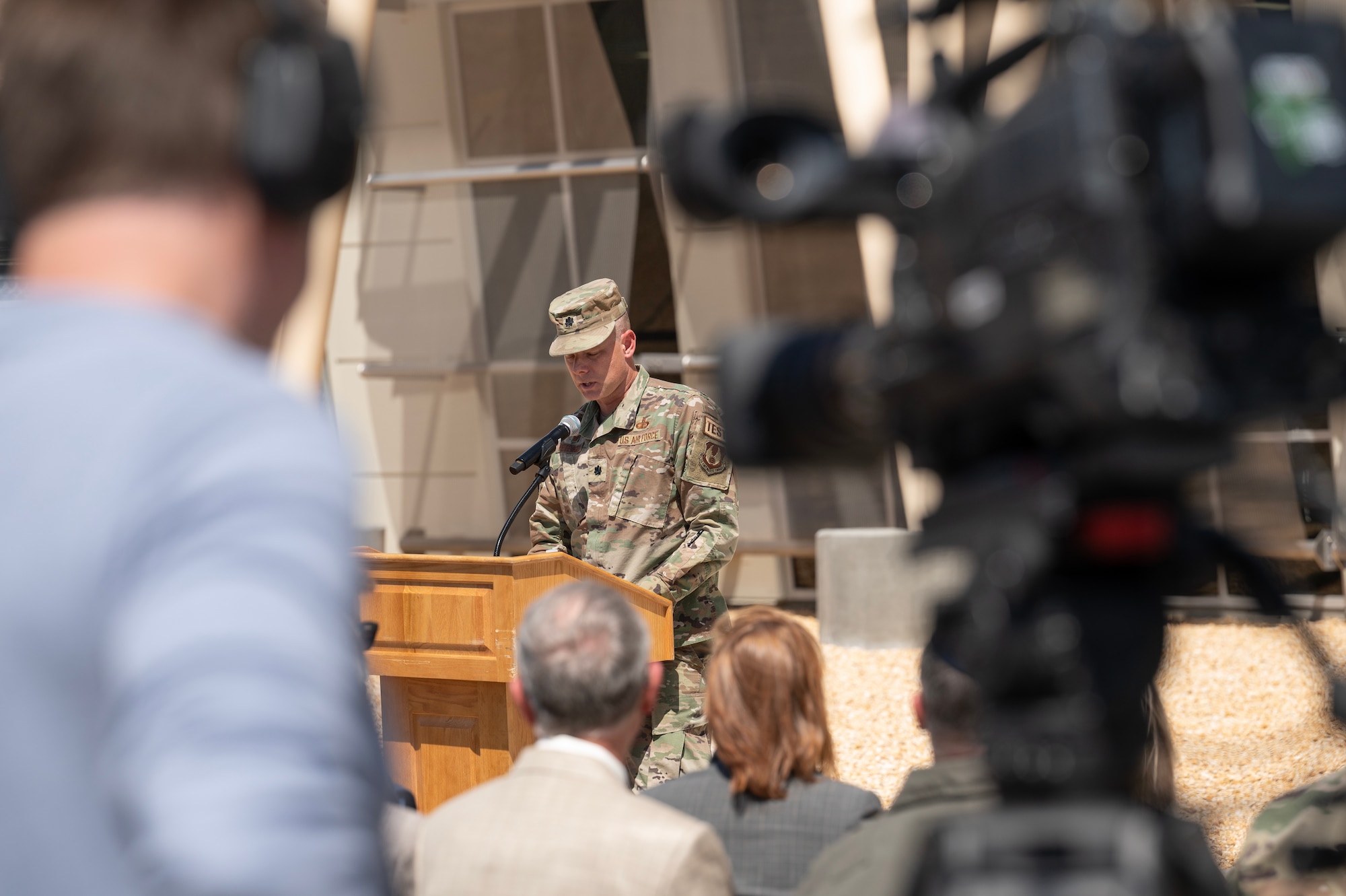 Lt. Col. James Petersen, 445 Test Squadron commander, gives a speech at the Digital Test and Training Range Facility Ribbon-Cutting Ceremony at Edwards Air Force Base, California, May 8, 2023. The mission 445 TS will begin performing at the DTTR will revolutionize test and training across the electromagnetic spectrum for multi-domain, multi-platform, system-of-systems scenarios. (U.S. Air Force Photo/Tech. Sgt. Robert Cloys)