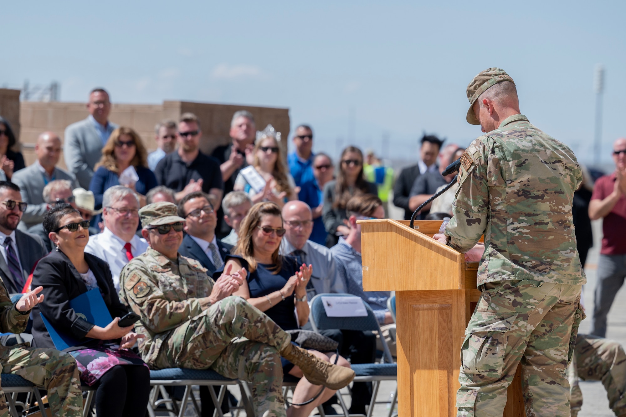 Lt. Col. James Petersen, 445 Test Squadron commander, gives a speech at the Digital Test and Training Range Facility Ribbon-Cutting Ceremony at Edwards Air Force Base, California, May 8, 2023. The mission 445 TS will begin performing at the DTTR will revolutionize test and training across the electromagnetic spectrum for multi-domain, multi-platform, system-of-systems scenarios. (U.S. Air Force Photo/Tech. Sgt. Robert Cloys)