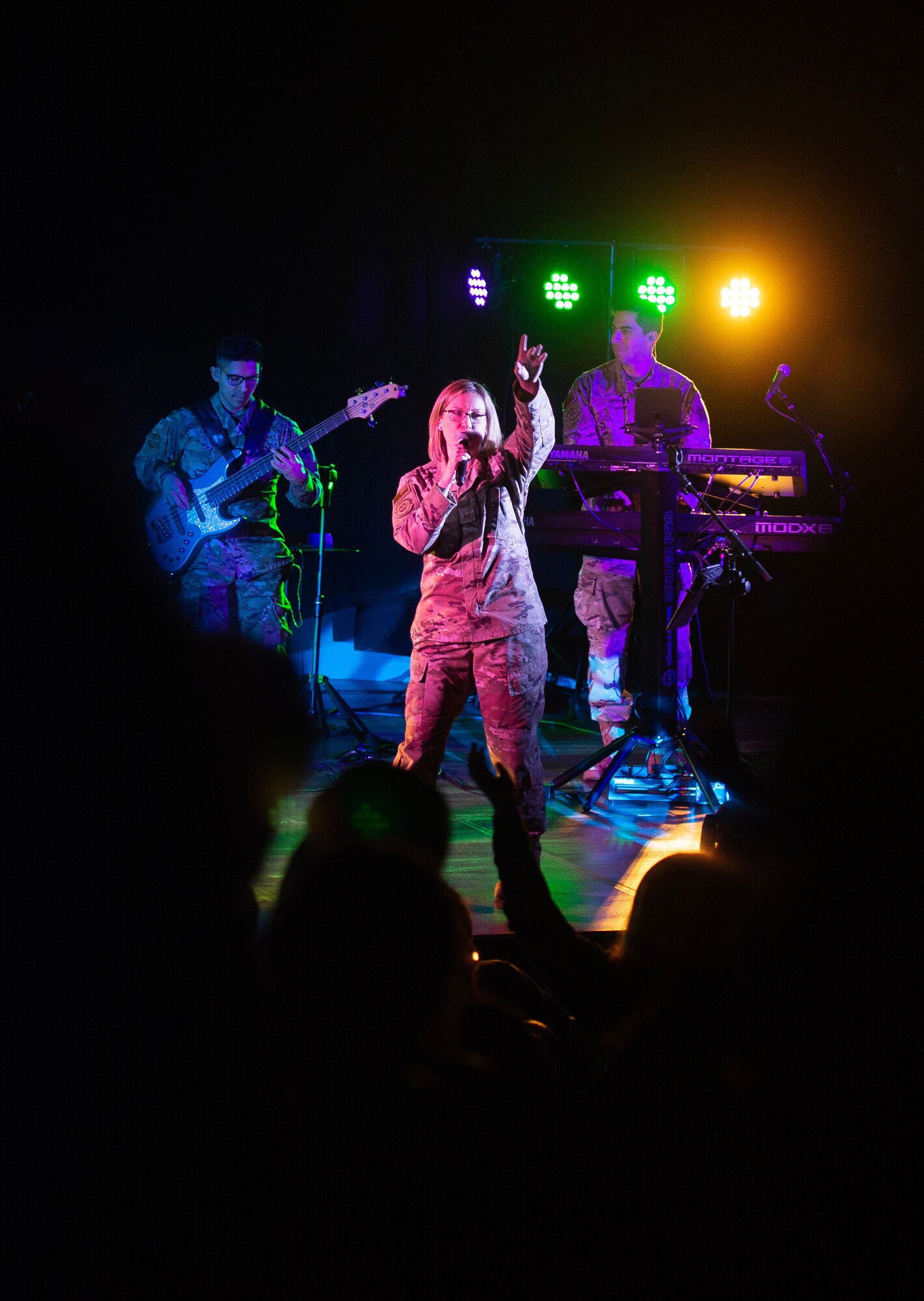 Airmen perform music for high school students