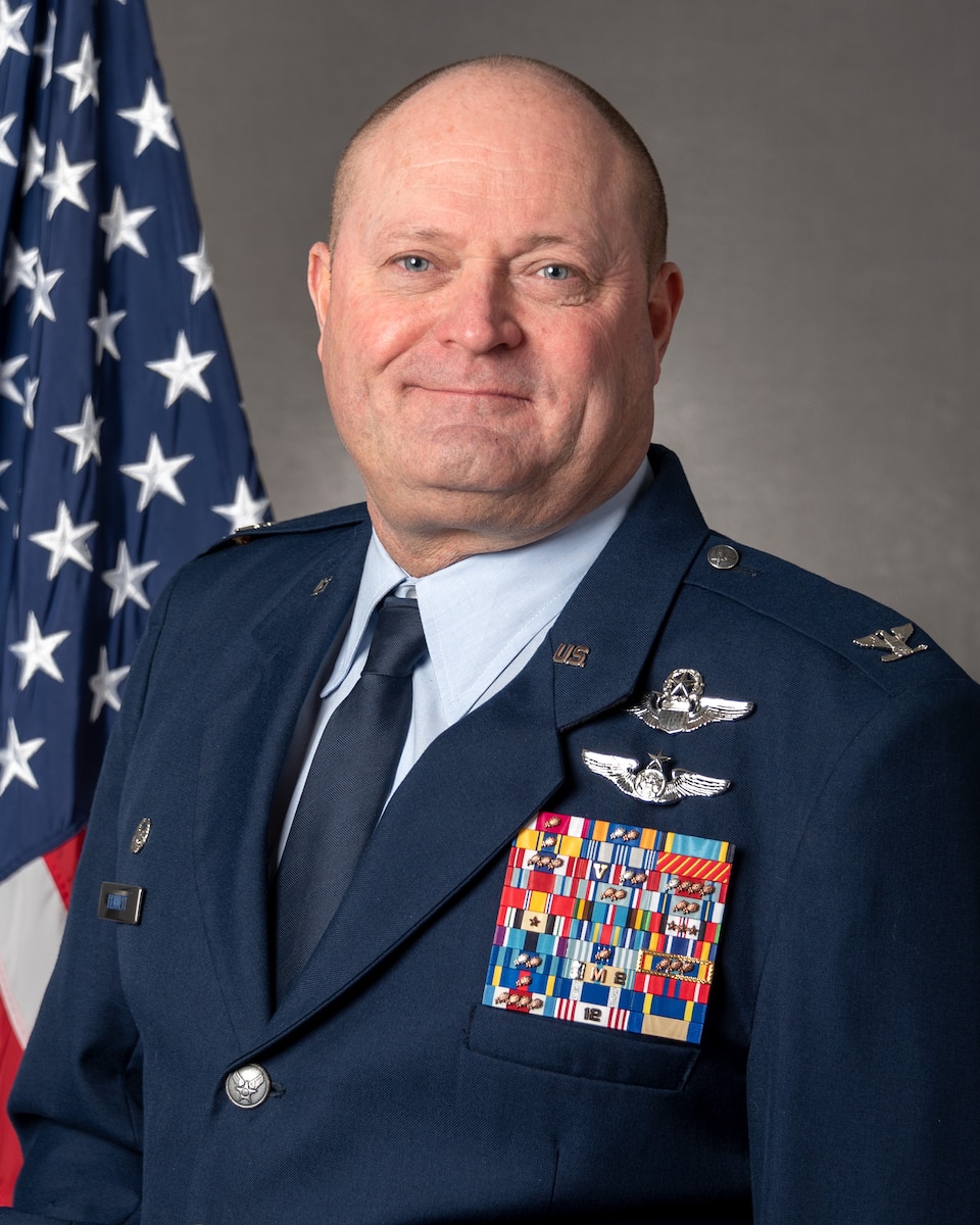U.S. Air Force Col. Bruce Bennett, the commander of the 182nd Maintenance Group, Illinois Air National Guard, poses for a portrait in Peoria, Illinois, Dec. 21, 2022.