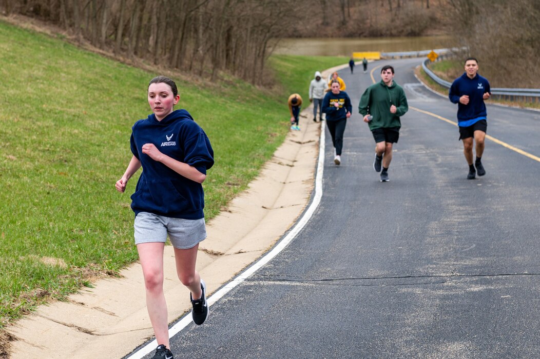 Airmen with the 182nd Airlift Wing, Illinois Air National Guard, run in the annual Sexual Assault Response and Prevention run/walk at the 182nd Airlift Wing in Peoria, Illinois, April 1, 2023.