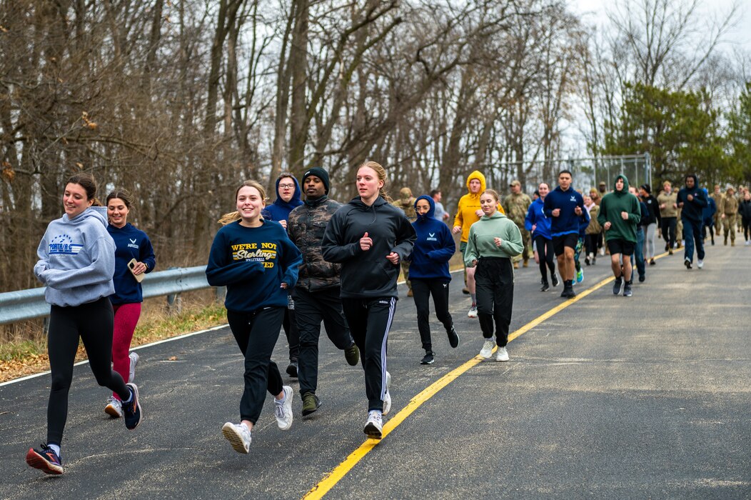 Airmen with the 182nd Airlift Wing, Illinois Air National Guard, run in the annual Sexual Assault Response and Prevention run/walk at the 182nd Airlift Wing in Peoria, Illinois, April 1, 2023.